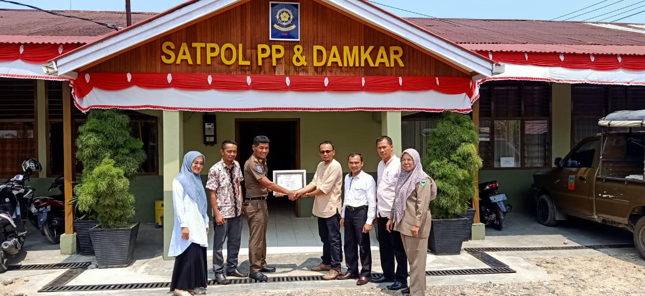 Kepala Satpol PP dan Damkar Pessel Terima Piagam Penghargaan
